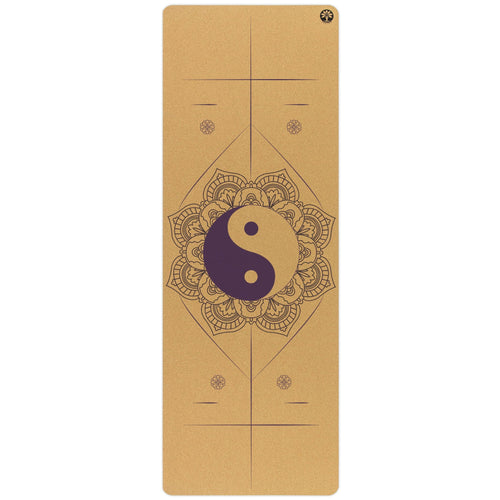 Yoga mat with yin yang symbol and mandala design on a white background