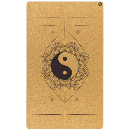 Yoga mat with yin yang symbol and mandala design on a white background